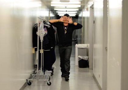 adam-backstage-hands.avif
