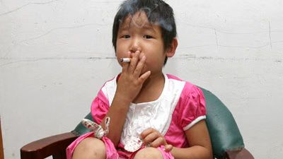 Girl Drinks Smokes.jpg