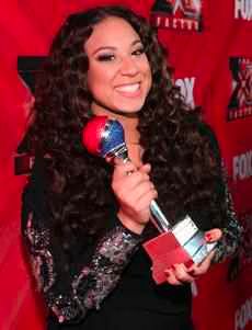 Melanie Amaro signs with Epic Records.jpg Melanie Amaro signs with Epic Records