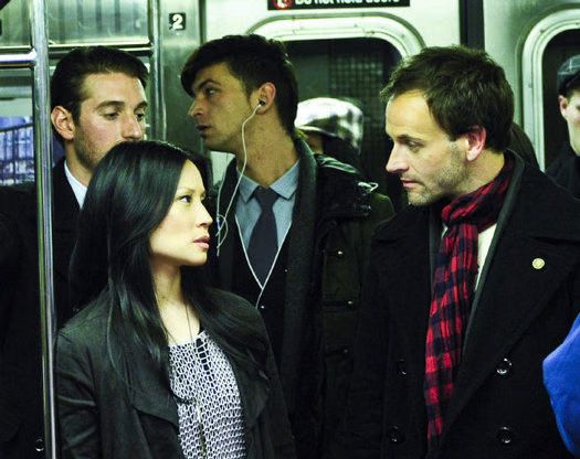 Watson, Holmes, and a pretentious scarf