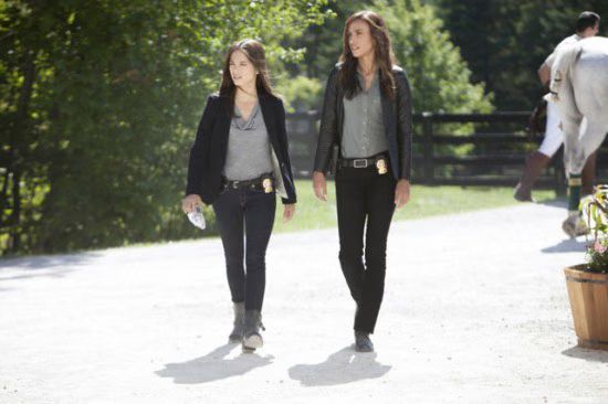 Cat and her partner, Tess Vargas (Nina Lisandrello)