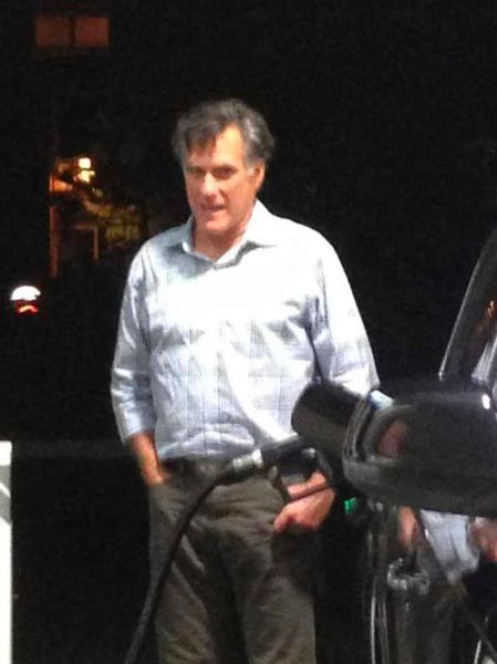 Mitt Romney pumping gas  Photo