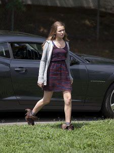 Dana walking to see her victim's family