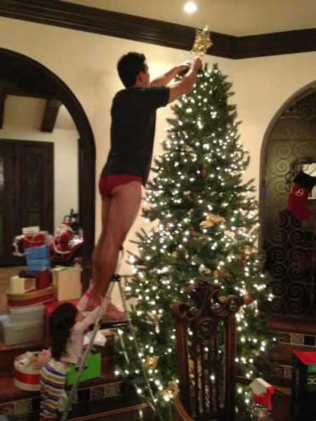 Mario Lopez hanging ornaments in underwear  Photo 01 2012 12 10