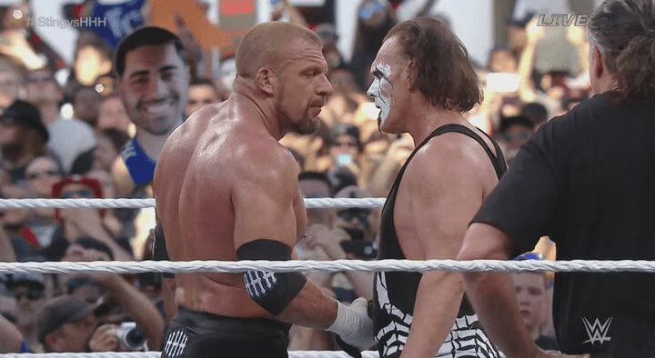 Sting and HHH shake hands at Wrestlemania 31