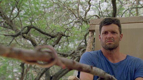 Survivor Worlds Apart Mike cooks a snake