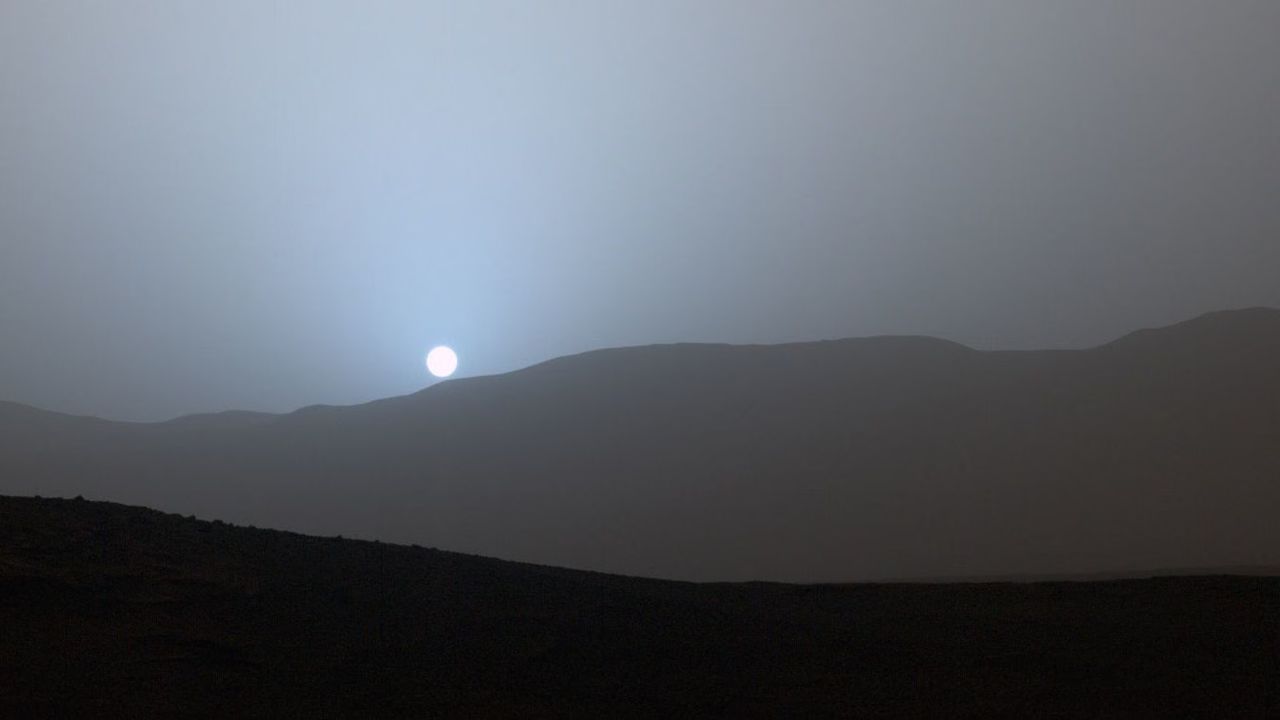 NASA's Curiosity Mars rover recorded this view of the sun setting at the close of the mission's 956th Martian day, or sol (April 15, 2015), from the rover's location in Gale Crater.