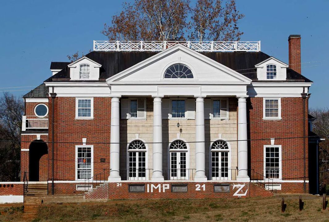 An exterior view of the Phi Kappa Psi fraternity house at the University of Virginia, in Charlottsville, Va., the site of an alleged sexual assault of a student revealed in a Rolling Stone article published, Nov. 19, 2014.