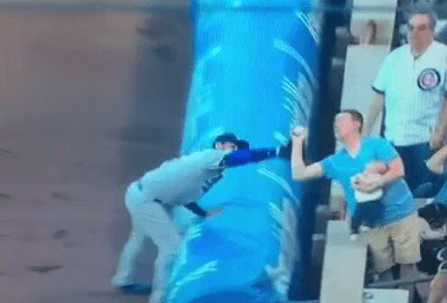 Chicago Cubs Fan Makes Epic Catch While... FEEDING THE BABY! (VIDEO)