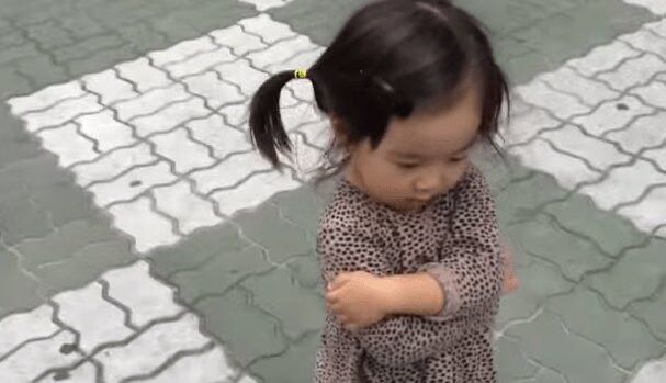 Grumpy Little Girl Cannot Sulk Because Of Her Squeaky Shoes (VIDEO)
