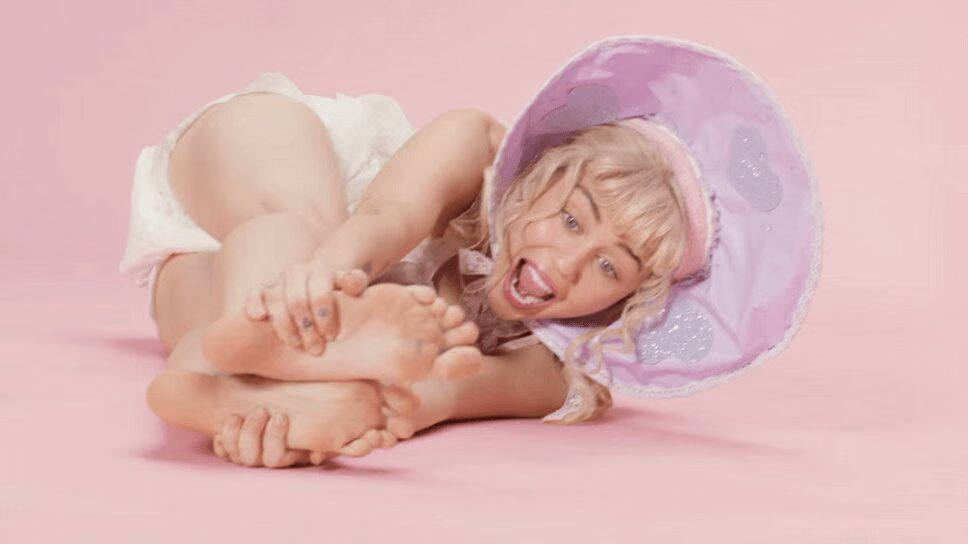 Miley Cyrus Becomes a Big Baby In Unsettling 'BB Talk' Music Video
