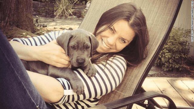 Source: CNN / Late Brittany Maynard with her dog Charley in San Francisco. Maynard, a 29-year-old with terminal brain cancer