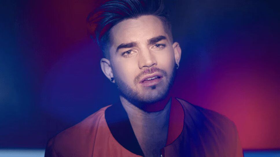 Adam Lambert Premieres Colorful 'Welcome To the Show' Music Video