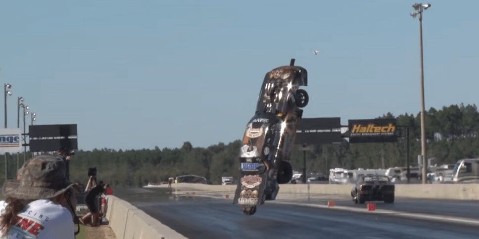 Drag Race Mustang Crashes, Flies 300 Feet Into Wall (VIDEO)